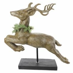 Christmas Decor Collections Shop 5 Deals 👏 21" Leaping Stag with Greenery Tabletop Accent by Ashland® 🛒